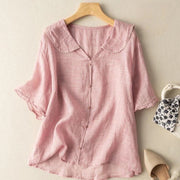 Locker sitzende Vintage-Bluse für Damen mit Knopfverzierung