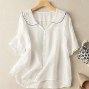 Locker sitzende Vintage-Bluse für Damen mit Knopfverzierung