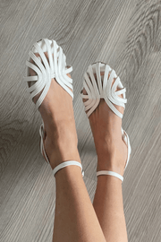 FLACHE GEFLOCHTENE SANDALEN