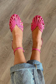 FLACHE GEFLOCHTENE SANDALEN
