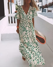CHRISTINE | Langes Sommerkleid mit lockerem Schnitt und elegantem grafischem Muster