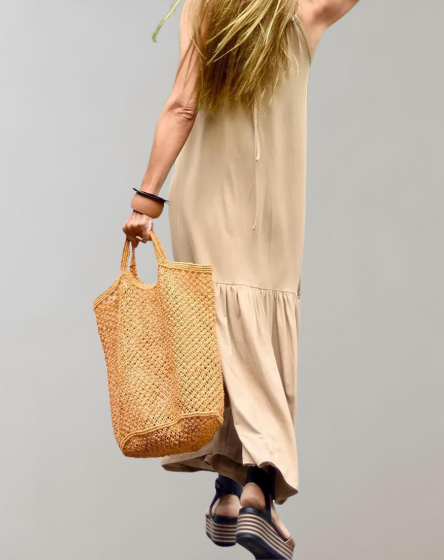 Elegantes Sommerkleid mit breitem Saum und Strapsen
