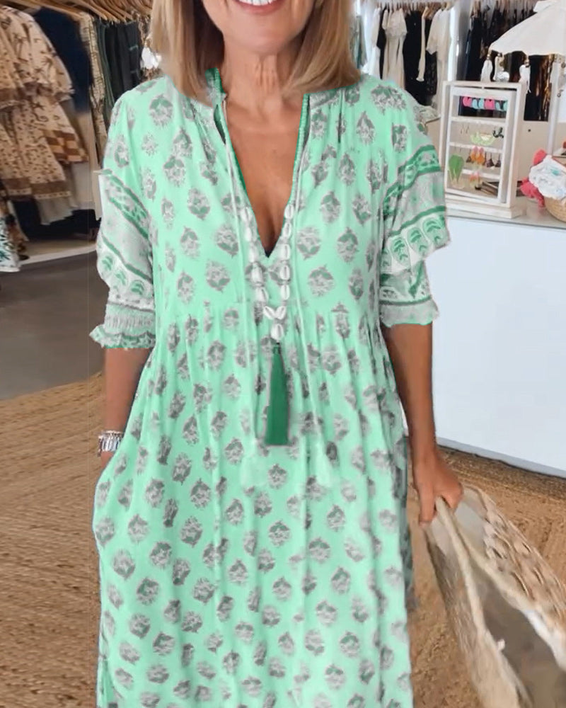 GIULIA | Gemustertes Midikleid mit V-Ausschnitt und eleganten Balloonärmeln