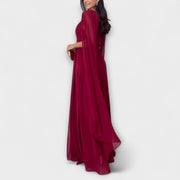 Mabel - Elegantes Maxikleid mit Cape-Ärmeln und hohem Schlitz" 

Rewritten: "Mabel - Stilvolles Maxikleid mit schwingenden Cape-Ärmeln und verführerischem Schlitz
