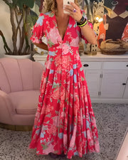 CATERINA | Langes Blumen midi Kleid mit versteckten Taschen und femininem Taglio für den Tag