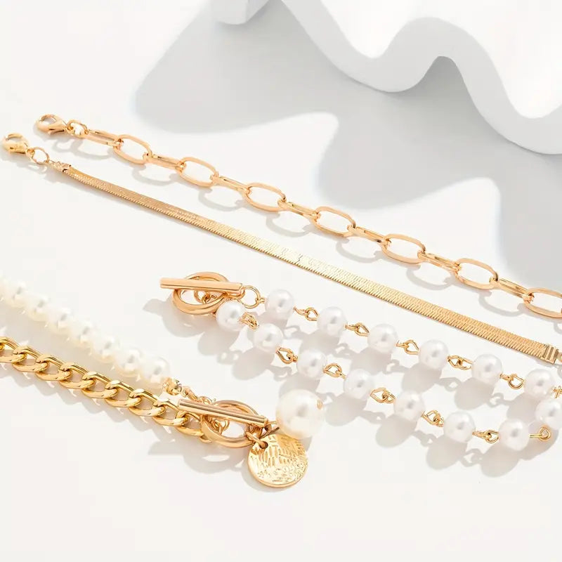 Elegantes 4-teiliges Armbandset in Gold – Schlange, Perlen & Glieder