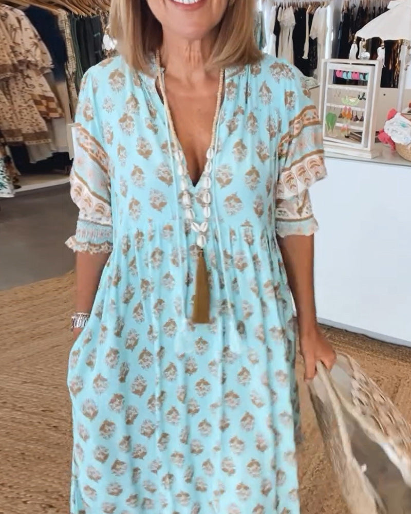 GIULIA | Gemustertes Midikleid mit V-Ausschnitt und eleganten Balloonärmeln