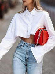 Cropped Damenbluse mit Raw Cut – Modern, Urban & Statementstark