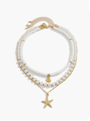 Mehrlagige Perlen- & Muschelkette mit Seestern-Anhänger – Strand-Schmuck