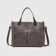 Elegante Handtasche aus hochwertigem pflanzlich gegerbtem Leder mit doppelten Fächern und Vintage-Charme