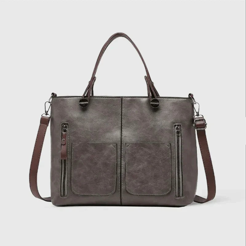 Elegante Handtasche aus hochwertigem pflanzlich gegerbtem Leder mit doppelten Fächern und Vintage-Charme
