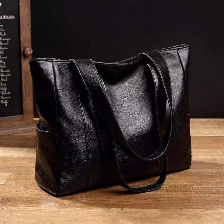 Elegante borsa a tracolla in pelle con design retrò