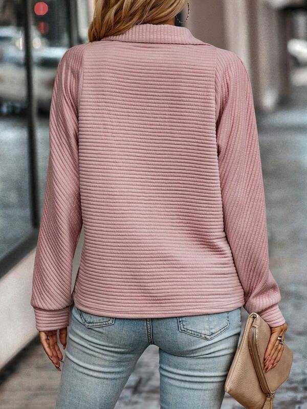 Eleganter Pullover mit V-Ausschnitt und Reißverschluss