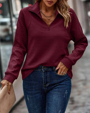 Eleganter Pullover mit V-Ausschnitt und Reißverschluss