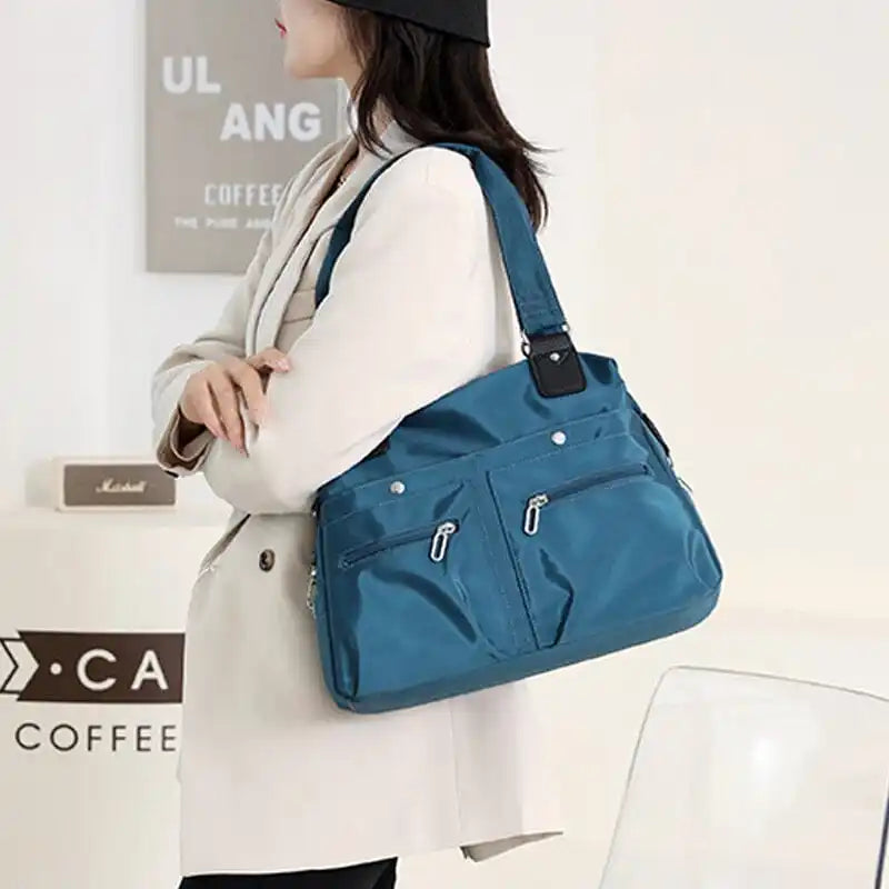 Elegante Wetterfeste Schultertasche für den Alltag