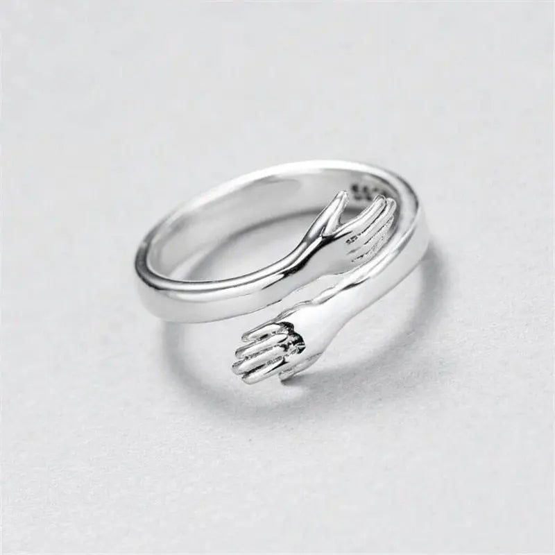 Verstellbarer Silberring mit Umarmungsdesign