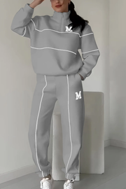Jogginganzug Damen | Trainingsanzug Damen | Kontrastlinien & Stehkragen für klare Silhouette