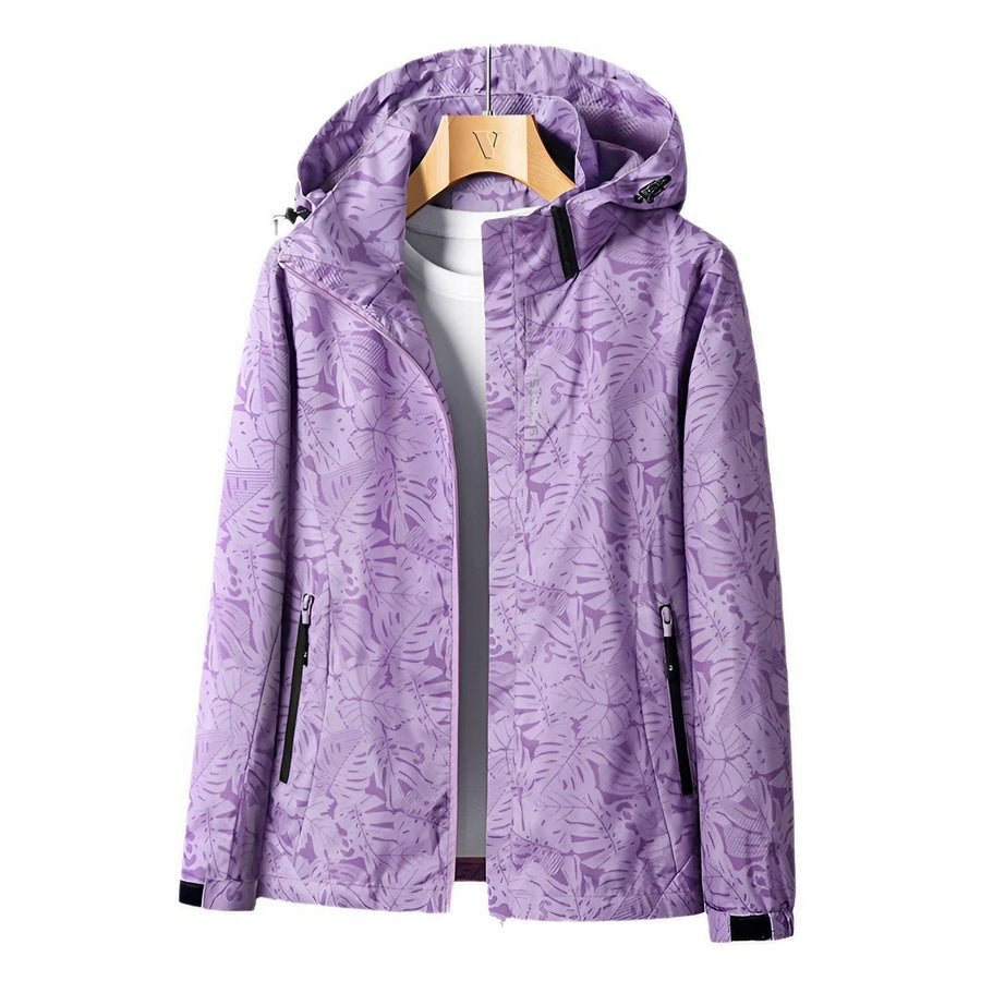 Damen Windjacke mit Kapuze – Leichte, wasserdichte Outdoor-Jacke mit floralem Print in Blau oder Rosa
