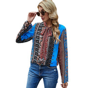 Damen Bluse mit Rüschendetails und kontrastierenden Mustern