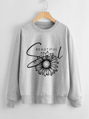 Damen Sweatshirt mit floralem Motiv und inspirierendem Schriftzug