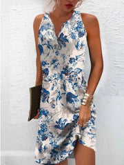 Damen, lässiges Sommerkleid mit V-Ausschnitt und asymmetrischem Saum Heidi-Mode