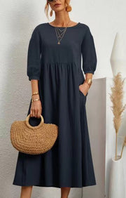 Damen Midi-Kleid mit Ballonärmeln und praktischen Taschen