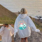 Damen Kapuzenpullover mit künstlerischem Wellenmotiv und inspirierendem Aufdruck