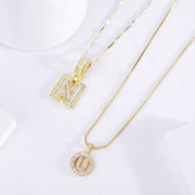 Set von Pavé Buchstaben-Anhängern | Gold
