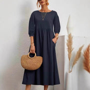 Damen Midi-Kleid mit Ballonärmeln und praktischen Taschen