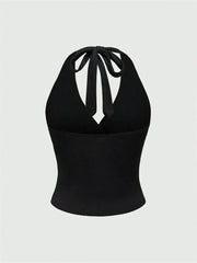 Top corto con collo halter e schiena scoperta | Top per donna