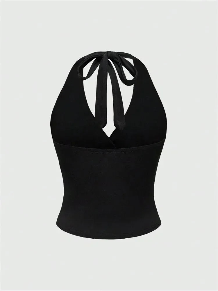 Top corto con collo halter e schiena scoperta | Top per donna