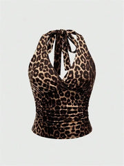 Top corto con collo halter e schiena scoperta | Top per donna