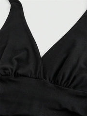 Top corto con collo halter e schiena scoperta | Top per donna