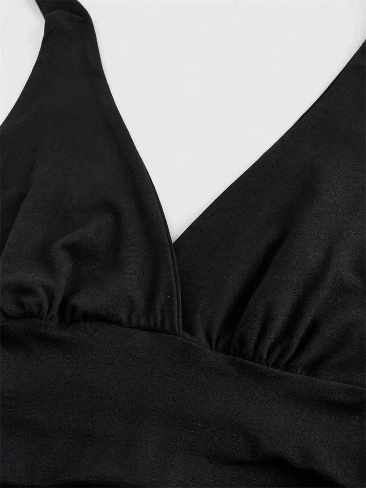 Top corto con collo halter e schiena scoperta | Top per donna