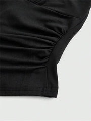Top corto con collo halter e schiena scoperta | Top per donna