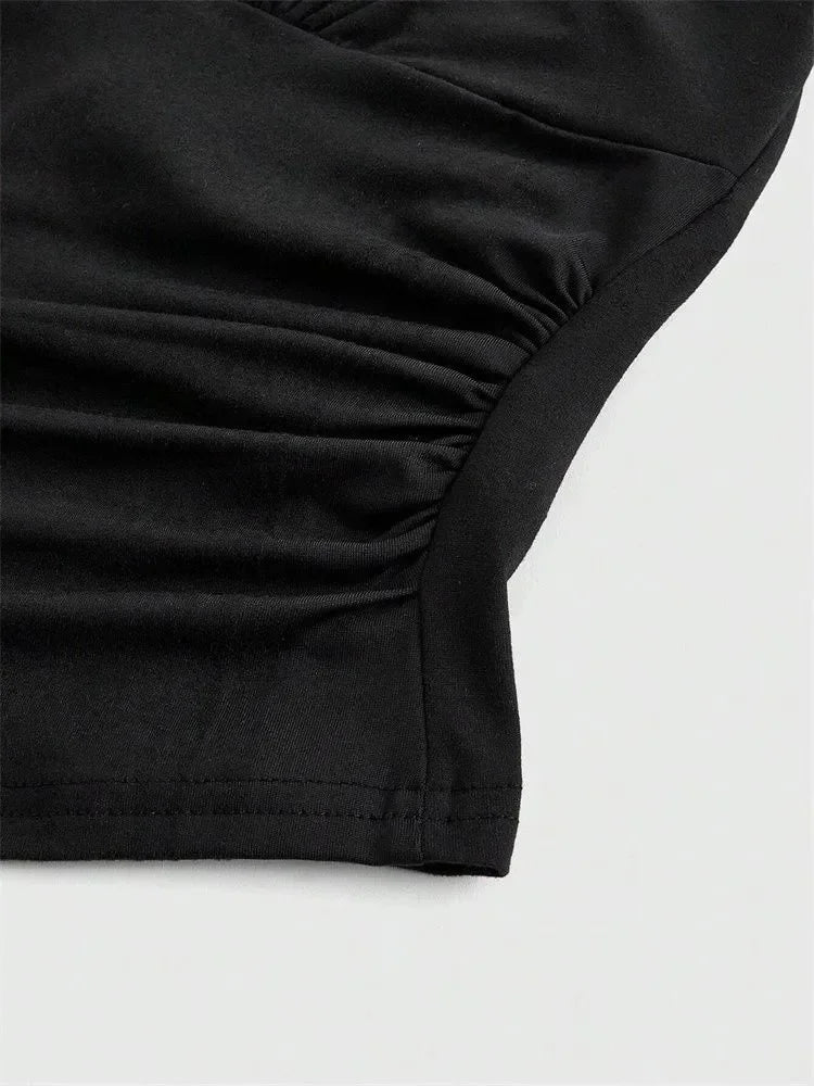 Top corto con collo halter e schiena scoperta | Top per donna