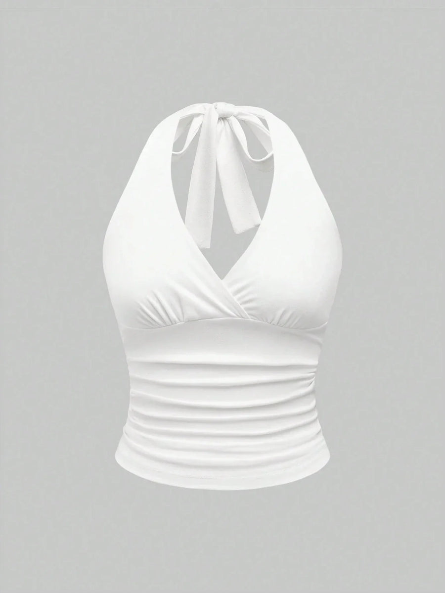Top corto con collo halter e schiena scoperta | Top per donna