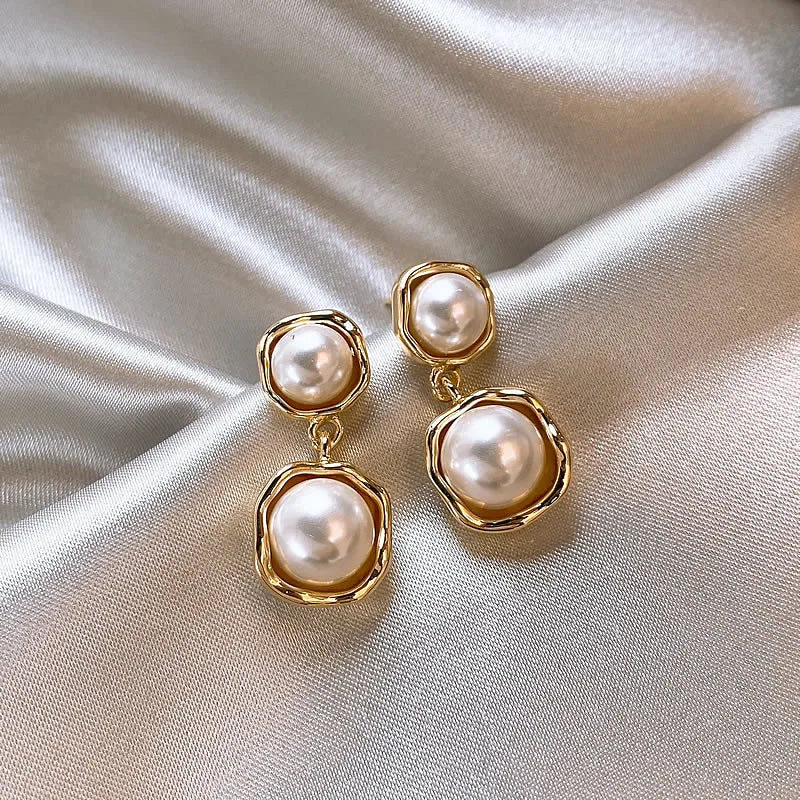Elegante Goldohrringe „Doppelperle“