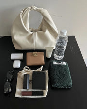 Gelyn Clutch Leder Tasche