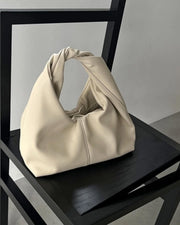 Gelyn Clutch Leder Tasche
