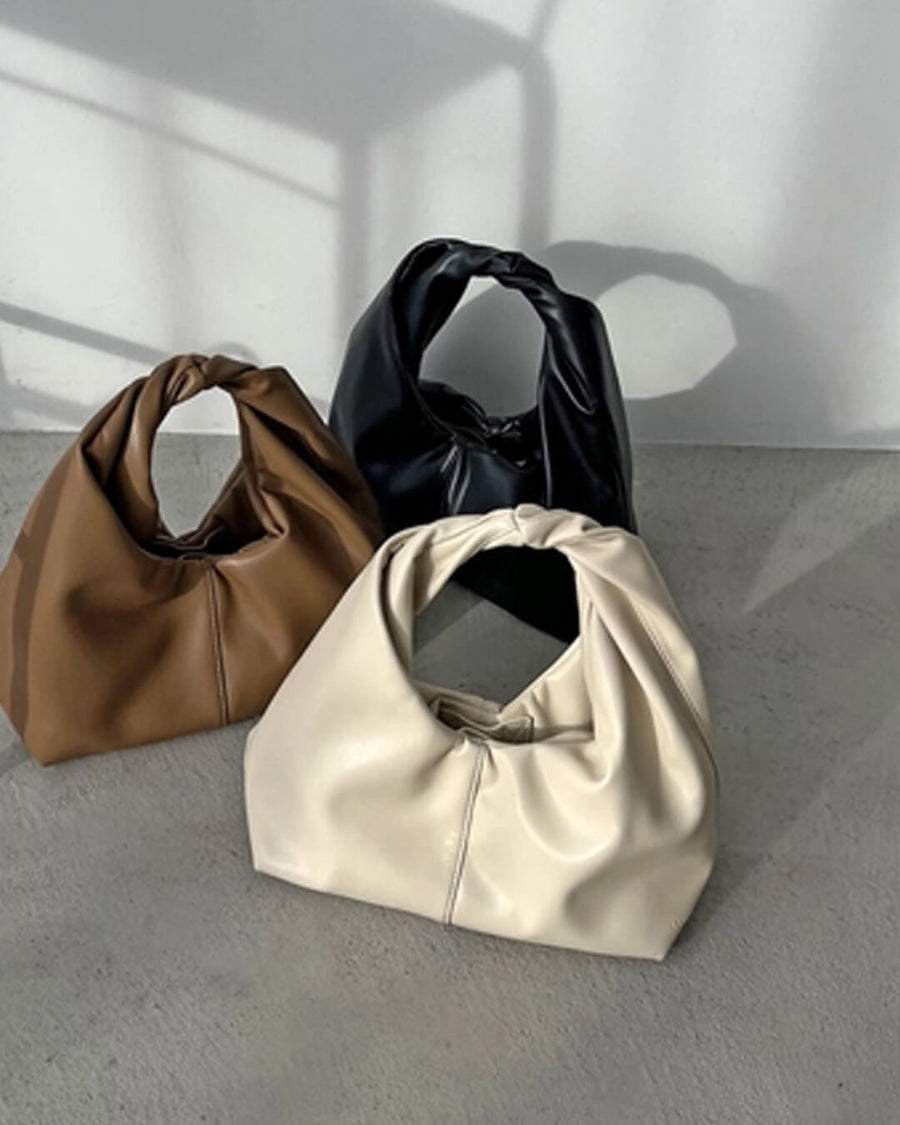 Gelyn Clutch Leder Tasche
