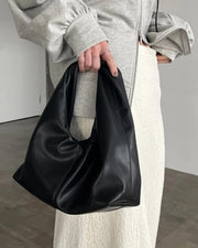 Gelyn Clutch Leder Tasche