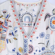 Bianca – shirt mit langen armeln, v-ausschnitt und stickerei
