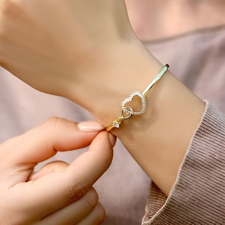 Infinito | Bracciale madre-figlia in oro bianco e oro