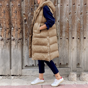 Lange gesteppte Damenweste mit Kapuze – Warme, ärmellose Weste für Herbst und Winter, ideal für lässige Outdoor-Looks