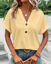 Damenbluse mit V-Ausschnitt und Stickmuster