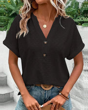 Damenbluse mit V-Ausschnitt und Stickmuster