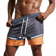 Heidi-Mode | Schnell Trocknende Badeshorts für Männer mit Farbblock-Patchwork