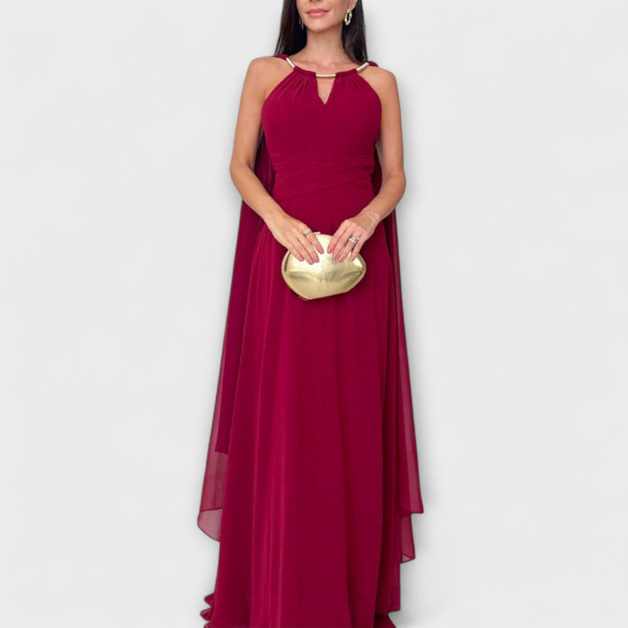 Mabel - Elegantes Maxikleid mit Cape-Ärmeln und hohem Schlitz" 

Rewritten: "Mabel - Stilvolles Maxikleid mit schwingenden Cape-Ärmeln und verführerischem Schlitz