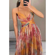 Amara – Elegantes Maxikleid aus floraler Chiffon, mit feinen Spaghettiträgern und raffiniertem Cut-Out